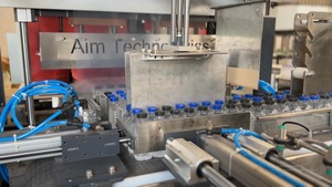 เครื่องพันสายรัดอัตโนมัติ Aim Technologies ขับเคลื่อนด้วยระบบ PLC ใช้สายรัด PET ให้ผลผลิตสูง เหมาะสำหรับบรรจุภัณฑ์ขวดพลาสติก - Product Image 5