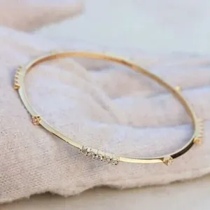 Brazalete de mujer con diamantes simulados de corte redondo de 3 quilates, chapado en oro amarillo de 14 quilates - Product Image 1