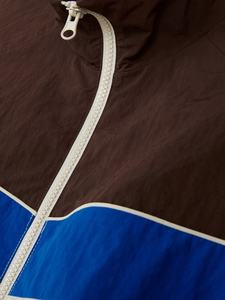 เสื้อแจ็คเก็ตกันลมแบบมีฮู้ดสำหรับผู้หญิง สีสันแบบคัสตอม ระบายอากาศได้ดี ตัดต่อสีสันแบบแพทช์เวิร์ค เหมาะสำหรับกิจกรรมกลางแจ้ง ผลิตจากไนลอนกันน้ำ - Product Image 4