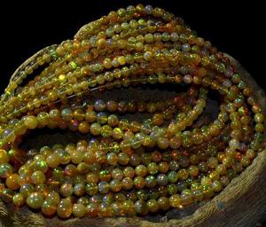Perles de pierres précieuses en vrac éthiopiennes Welo Opal Multi-Fire Poli Forme unie pour la fabrication de bijoux Prix de gros naturel de haute qualité - Product Image 1