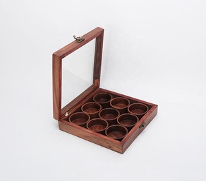 Creative Low MOQ Handmade Carved Mango Wood 9 Rounds <b>Spice</b> Box Manufacturer Wholesaler factory direct sale - Product Image 1