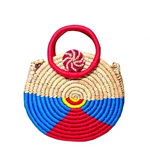 Panier en herbe tressé à la main en gros avec garniture festive et poignée – Panier de rangement écologique et élégant fait main - Product Image 1