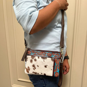 กระเป๋าสะพายพาดลำตัวหนังวัวขนาดเล็กสีเทอร์ควอยส์มือสำหรับผู้หญิงกระเป๋าใส่มือถือกระเป๋าถือหนังตะวันตกมีตราสินค้าตามสั่ง - Product Image 2