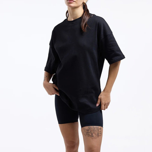 Camiseta de punto transpirable de manga corta con cuello redondo para mujer, corte regular, color liso, estilo casual urbano, hombro caído, venta al por mayor - Product Image 1