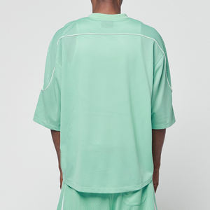 ชุดเสื้อฟุตบอลอเมริกันสีเขียวมิ้นท์พรีเมียม ผ้าตาข่าย แต่งขอบตัดสี ทรงโอเวอร์ไซส์ ไหล่ตก ผลิตตามสั่งแบบ B2B - Product Image 4