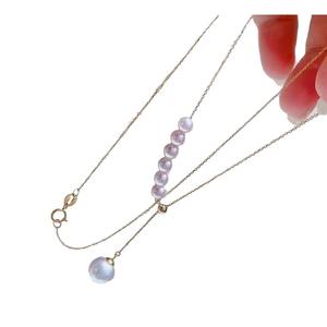 สร้อยคอไข่มุกน้ำจืดธรรมชาติ 7-11 มม. พร้อมจี้ทอง 18K รูปเมล็ดแตงโม ประกายเงางาม 5A และสร้อยคอแบบคล้องไหปลาร้า - Product Image 5