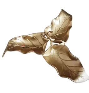 Tazón para servir condimentos de metal con diseño de hoja con acabado dorado de alta venta para restaurante y bar de hotel - Product Image 1