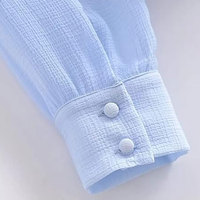 Chemise habillée en coton de luxe pour femme à manches longues avec col boutonné