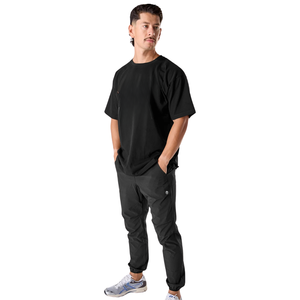 Pantalon de jogging athlétique fuselé léger noir pour homme Infinity Tech avec poches zippées – Fourniture en gros personnalisée OEM - Product Image 4