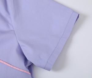 Tops d'uniformes médicaux pour femmes en tissu tissé Spandex/Polyester, produit très demandé, haute qualité, prix abordable, vente en gros - Product Image 4