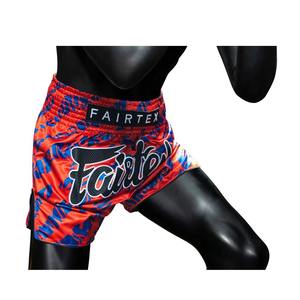 กางเกง MMA Fairtex สำหรับผู้ใหญ่ ลายเปลวไฟสีแดงน้ำเงิน ทรงปกติ ระบายอากาศได้ดี ทนทาน ผลิตจากโพลีเอสเตอร์ 140 กรัม - Product Image 1