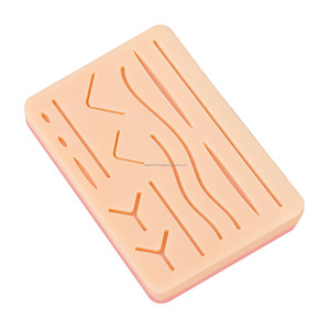 Almohadilla de Práctica de Sutura con 14 Heridas de Silicona Pre-cortadas, Almohadilla de Entrenamiento Quirúrgico, Certificación CE e ISO, Proveedor Mayorista - Product Image 1