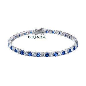 Bracelet en or blanc pour femme avec diamants de laboratoire taille brillant ronde et pierres latérales en saphir – Bijou de mariage classique - Product Image 1
