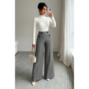 Pantalones de cintura alta con corte cruzado y pierna ancha en gris. Cintura alta con una silueta de pierna ancha o paralela. - Product Image 1