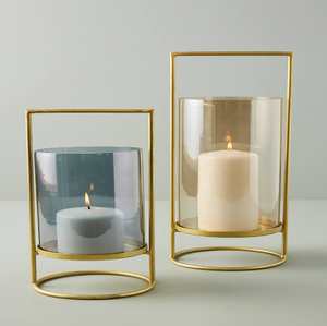 Fancy interlocking textured gold ring <b>candelabra</b> supporting three white spiral taper candles beautifully. Available at wholesale - Product Image 2