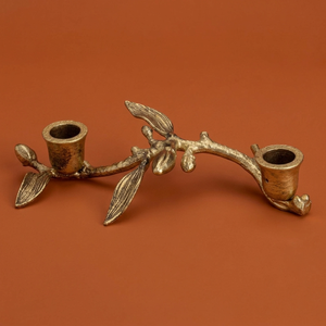 Exquisite Gold Botanical Taper Holder Features A Textured <b>Vine</b> Branch Design With Delicate <b>Leaves</b> And Two Detailed Candle Cups - Product Image 1