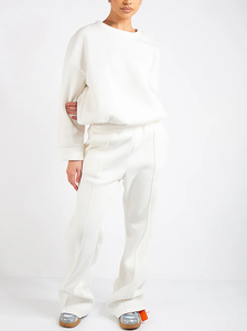 ชุดเซ็ตเสื้อสเวตเชิ้ตแขนยาวทรงหลวมและกางเกงขายาวผ้าฝ้าย 100% น้ำหนักเบา รับทำโลโก้ OEM ชุดเซ็ต 2 ชิ้นสำหรับผู้หญิง MOQ ต่ำ - Product Image 2