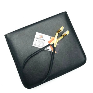 Venta al por mayor de alicates de extensión de pelo de acero inoxidable de alta calidad con cinta de Oro Negro conveniente embalaje sostenible en una bolsa - Product Image 1