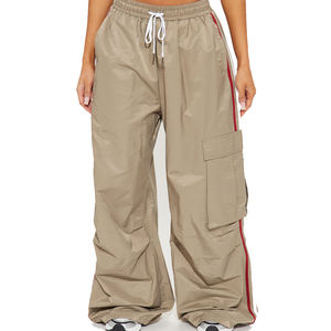 Pantalones cargo para mujer al por mayor, pantalones cargo de cintura baja con cordón, pantalones deportivos holgados para mujer, pantalones cortavientos de nailon, pantalones tipo paracaídas OEM - Product Image 1