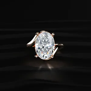 Bague de luxe ovale en or jaune avec diamant solitaire de laboratoire serti en bypass pour femme, idéale pour fiançailles et mariage, avec certification IGI - Product Image 1