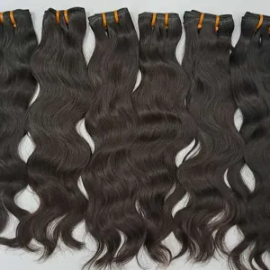 Tramas de cabello de templo indio crudo de precios más baratos Onda natural disponible en cantidades a granel