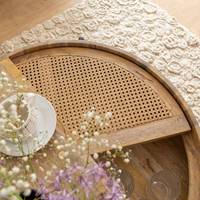 Table basse ronde Vandana Aston Vista en bois et cannage