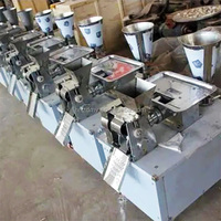 Petite machine commerciale à rouleaux de printemps Machines à empanadas et boulettes Machine à boulettes pastel