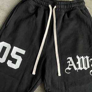 กางเกงวอร์มสีดำสำหรับผู้ชาย เอวยางยืด มีเชือกผูก รุ่น AWJ 05 พิมพ์ลายตัวอักษร สไตล์ลำลอง ผ้าฝ้ายเนื้อปานกลาง สไตล์ฤดูใบไม้ร่วง - Product Image 4