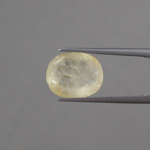 พลอยแซฟไฟร์สีเหลือง TATIWALA รูปไข่ ขนาด 13.5x11 มม. น้ำหนัก 9.65 กะรัต ได้รับการรับรองจาก IGI เหมาะสำหรับทำเครื่องประดับ สีธรรมชาติ 100% น้ำมันสี - Product Image 1