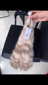 Vente en gros d'extensions de cheveux humains vierges vietnamiens 100% soyeux et droits non transformés approvisionnement en vrac de style vague naturelle brute de la NASA - Product Image 2