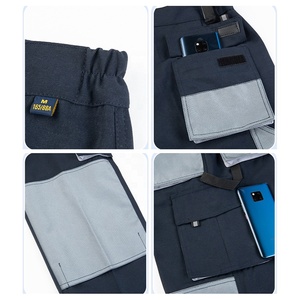 Combinaison de travail unisexe bleu foncé avec bordure verte, plusieurs poches, résistante aux abrasions, usage industriel - Product Image 6