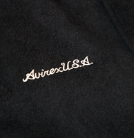 Veste varsity noire pour homme Avirex sur mesure OEM ODM avec manches en cuir et logo brodé sur le devant