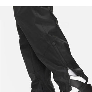 Wholesale Men's Waterproof Quick Dry Track Pants <b>Lightweight</b> Windbreaker Sports <b>Joggers</b> with Zipper Pockets Training Trousers - Product Image 4
