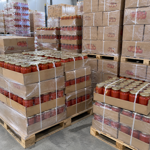 Base de purée de tomates transformée avec pâte de tomates en conserve dans des boîtes hermétiques pour une conservation prolongée et des approvisionnements en vrac - Product Image 1