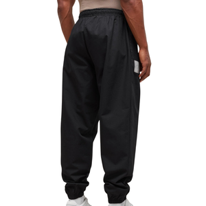 Pantalon de survêtement noir oversize pour homme, coupe ample, taille élastique, idéal pour la gym et l'entraînement - Product Image 2