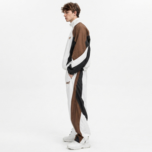 Veste coupe-vent pour homme avec logo brodé personnalisé OEM, pantalon en nylon ample, style streetwear surdimensionné, ensemble survêtement imprimé pour homme - Product Image 3