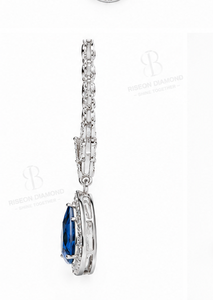 Elegant pendant <b>necklace</b> in 18K white gold with pear cut blue sapphire centerpiece classic halo of sparkling lab grown diamonds - Product Image 5