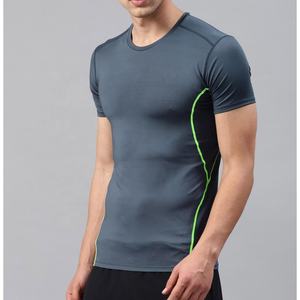 เสื้อรัดรูปผู้ชายแบบแห้งเร็วสำหรับ MMA สีเทาเข้ม พร้อมตะเข็บสีเขียวนีออน แขนสั้น สำหรับศิลปะการต่อสู้แบบผสมผสาน - Product Image 3