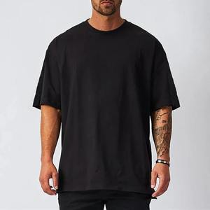 Nouveau T-shirt pour homme, col rond, manches courtes, hauts et t-shirts pour homme, T-shirt de fitness pour homme, vêtements pour homme, T-shirt noir uni en coton surdimensionné pour homme - Product Image 1