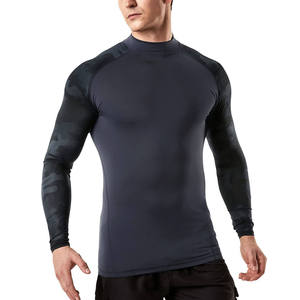 Vente en gros de chemises de compression à manches longues pour hommes, personnalisées, MMA UPF50+, anti-UV, respirantes, à séchage rapide, sublimation - Product Image 1