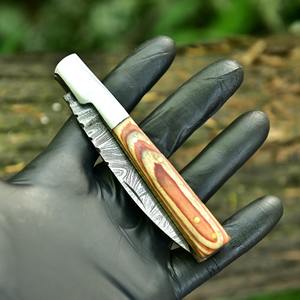 Couteaux pliants d'extérieur avec lame en acier finition stonewashed et manche robuste, conçus pour la pêche et les activités en plein air. - Product Image 6