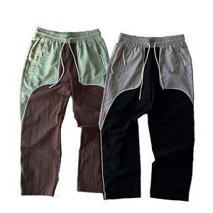 Crinkle Fabric Panel <b>Baggy</b> Trousers Men Loose Fit Streetwear Pants Textured Panel <b>Jogger</b> Pants Oversized Fashion Trousers Unisex - Product Image 1