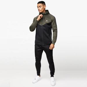 ชุดออกกำลังกายฤดูหนาวสำหรับผู้ชาย คุณภาพสูง ผ้าโพลีเอสเตอร์ 92% ผสมอีลาสเทน 8% ทรงเข้ารูป ระบายอากาศได้ดี ป้องกันแบคทีเรีย พิมพ์ลายโลโก้ตามสั่ง - Product Image 1