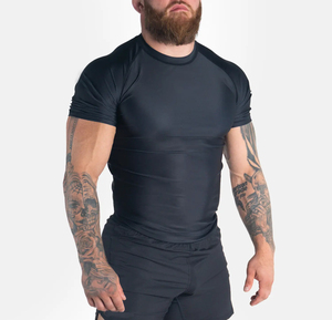 เสื้อรัดรูปแขนยาวระบายอากาศได้ดีสำหรับผู้ชายและผู้หญิง MMA BJJ ยิวยิตสู แห้งเร็ว ผลิตจากโพลีเอสเตอร์ผสมสแปนเด็กซ์ รับผลิตแบบ OEM และรับทำแบรนด์ส่วนตัวสำหรับชุดกีฬา - Product Image 1