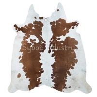 Cheveux de peau de vache sur le tapis en cuir de peau de vache véritable peaux de cuir respirantes brutes nouveau cuir d'animal de conception exotique