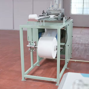 Máquina para enrollar almohadillas de compresión - Product Image 2