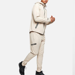 Conjunto Deportivo de Invierno para Hombre de Alta Calidad, Diseño Personalizado al por Mayor, Chaqueta Cortavientos de Poliéster Colorida con Detalles Reflectantes - Product Image 1