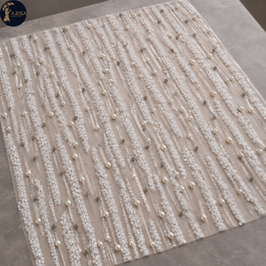 Tissu de robe orné de perles et de paillettes, avec des traînées verticales irrégulières et des détails en maille transparente |   Robe de mariée, tenue de soirée, textile fin - Product Image 3