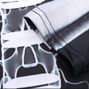 เสื้อคอมเพรสชั่นขายส่ง OEM สำหรับผู้ชาย โลโก้สั่งทำได้ แขนยาว ป้องกันการระคายเคือง ผ้าทันสมัย สไตล์สปอร์ต สำหรับว่ายน้ำในฤดูร้อน - Product Image 4