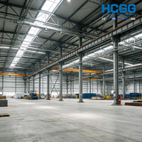 Bâtiment de stockage logistique industriel à grande portée, préfabriqué, moderne, en structure d'acier lourd, avec poutres en H, à construction rapide
